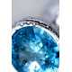 Серебристая конусовидная анальная пробка с голубым кристаллом - 8 см.